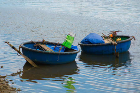 Traditional Vietnamese boat in the basket shaped , Phan Thiet, Vietnam. Old boats for fishermenの写真素材