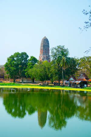 Ancient palaces,ancient building.Green trees reflected in the water. Ayutthaya Thailand.の写真素材