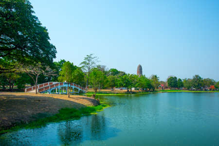 Ancient palaces,ancient building.Green trees reflected in the water. Ayutthaya Thailand.の写真素材