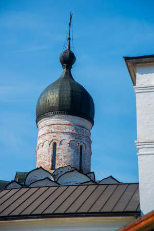 Beautiful vintage Orthodox religious structures on the background of blue sky.Spring, Sun.の写真素材