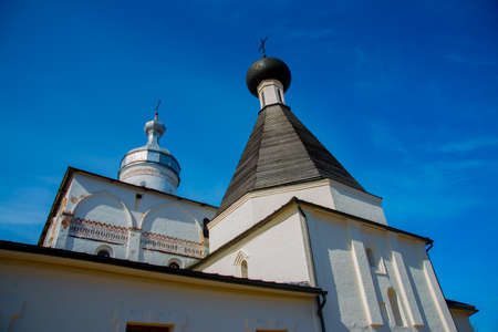 Beautiful vintage Orthodox religious structures on the background of blue sky.Spring, Sun.の写真素材