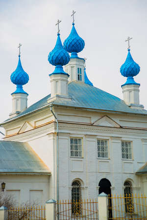 The Orthodox Church is white with blue domes in Russia.