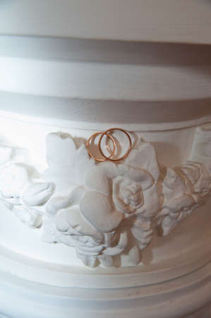 Beautiful gold jewelry lying around flowers.Wedding.Loveの写真素材