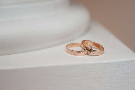 Beautiful gold jewelry lying around flowers.Wedding.Loveの写真素材