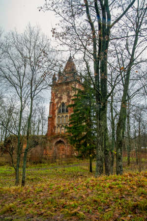 Autumn.Russia,the town of Pushkin, Tsarskoe Selo. Alexander park.Chapelle, an old ruined tower in the Gothic styleの写真素材