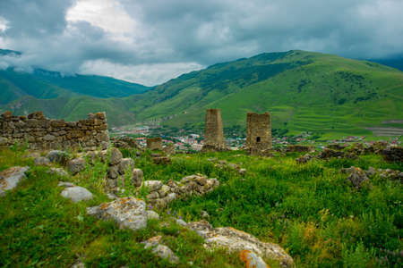 Beautiful mountains in the clouds on the blue sky background,the summer.The Caucasus..Russia.の写真素材