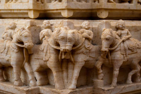 The old stone temple. Fragments of walls,sculptural details that adorn the temple. Udaipur, Indiaの写真素材