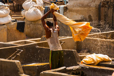 Industrial scene from the viewing gallery at the commercial hand wash laundry in the heart of the city Bombay, Mumbai, Indiaの写真素材