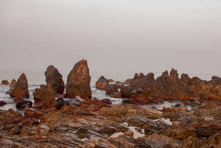 Rocks, stones, sea. Beauty Arambol beach landscape, Goa state, Indiaの写真素材