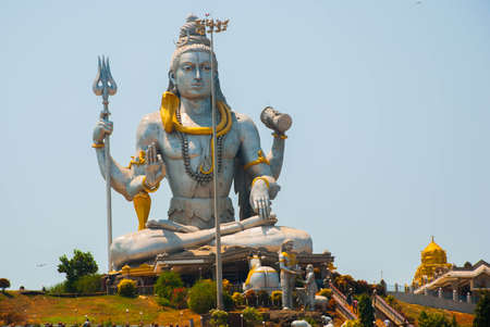 Statue of Lord Shiva was built at Murudeshwar temple on the top of hillock which overlooks the Arabian Sea and it is 37 meters in height. Murudeshwar. Karnataka, Indiaの写真素材