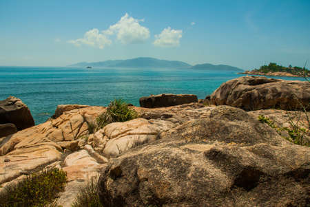 Beautiful sea the mountains on the horizon.The garden of stones, popular tourist destinations at Nha Trang. Vietnamの写真素材