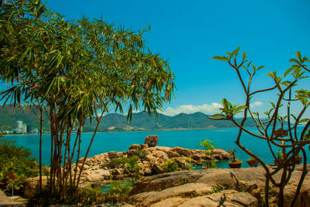 Beautiful sea the mountains on the horizon.The garden of stones, popular tourist destinations at Nha Trang. Vietnamの写真素材