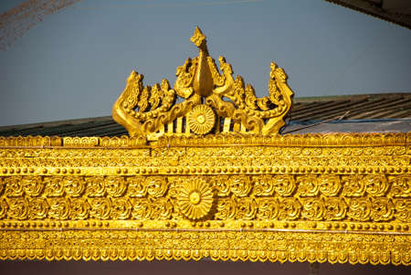 Golden rock or Kyaiktiyo pagoda with blue sky background, Myanmar. Burmaの写真素材