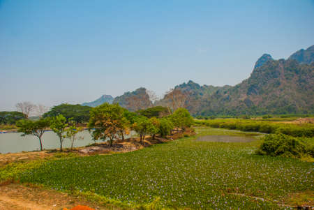 Top view Kyauk Ka Lat Pagoda with the beautiful scenery the place around cities