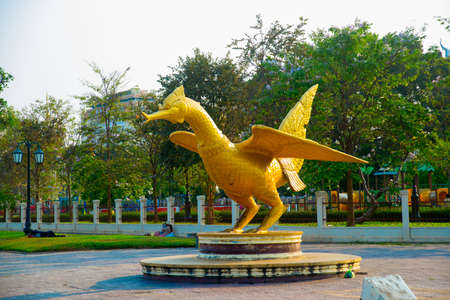 Huge Golden sculpture of a bird located in the capital of Cambodia. Phnom Penh.の写真素材