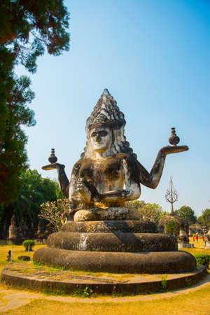 Landscape view ancient statues and sculptures of hindu and buddhism gods in Buddha Park, Vientiane, Laosの写真素材