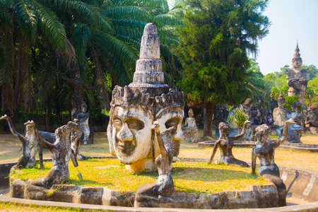Landscape view ancient statues and sculptures of hindu and buddhism gods in Buddha Park, Vientiane, Laosの写真素材