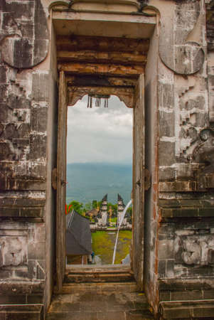 Traditional balinese temple guards at the entrance to Pura Penataran Agung Lempuyang on Bali, Indonesiaの写真素材