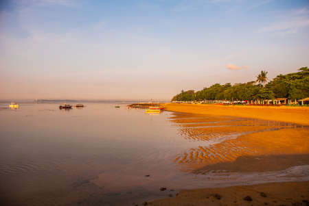 Beautiful dawn on the beach in Sanur. Bali, Indonesiaの写真素材