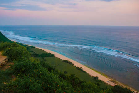 very beautiful beach in Bali, a top view of sea during sunset Uluwatu. Bali, Indonesia.の写真素材