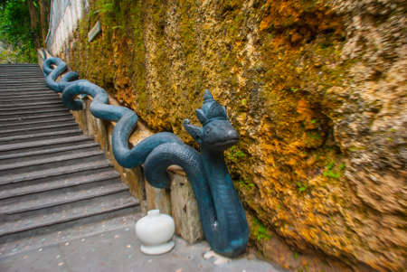 Garuda Wisnu Kencana Cultural Park, staircase and a sculpture of a huge snake Bali. Indonesia.の写真素材