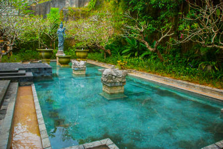 Beautiful small pool with a sculpture. Garuda Wisnu Kencana Cultural Park. Bali. Indonesia. GWK.の写真素材