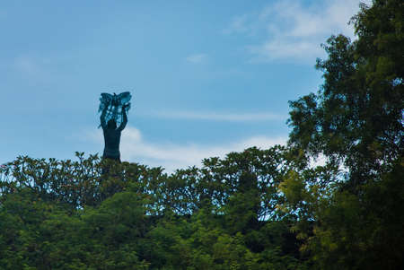 Garuda Wisnu Kencana Cultural Park.Sculpture, statue of man who lets a bird into the sky. Bali. Indonesiaの写真素材