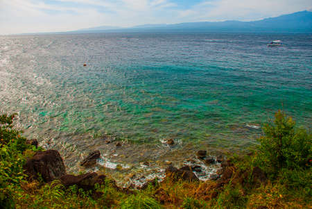 Beautiful sea. Apo island, Philippines, view on island beach line. The view from the top.の写真素材