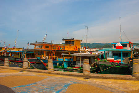 Ships at the Central port. Kota Kinabalu City is the capital of the state of Sabah, located in East Malaysia.の写真素材