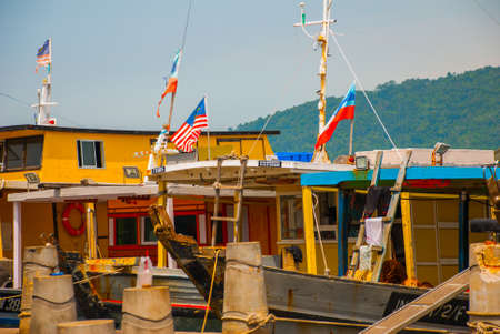Ships at the Central port. Kota Kinabalu City is the capital of the state of Sabah, located in East Malaysia.の写真素材