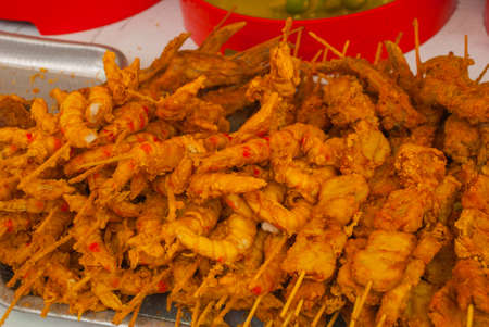 The street market selling fried shrimps in Kuching, Sarawak Borneo island Malaysiaの写真素材