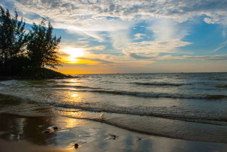 Beautiful Landscape view of the water, sky and clouds during sunset, city Bintulu, Borneo, Sarawak, Malaysia, Pantai Temasya Tanjung Batuの写真素材