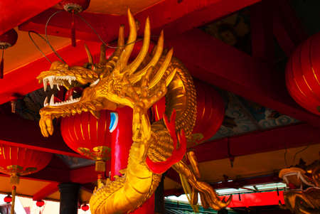 Golden dragon on the pole. Beautiful Chinese Temple Tua Pek Kong. Miri city, Borneo, Sarawak, Malaysiaの写真素材
