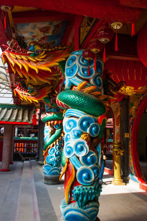 Multi-colored dragon on the pole. Beautiful Chinese Temple Tua Pek Kong. Miri city, Borneo, Sarawak, Malaysiaの写真素材