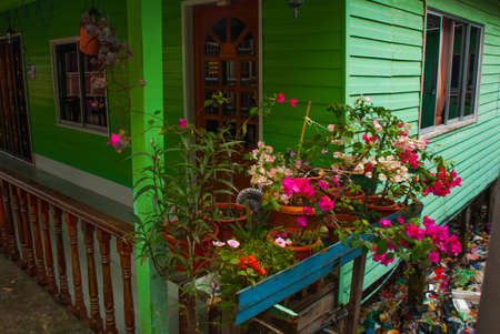 Traditional houses on stilts over the water. Sandakan city, Borneo, Sabah, Malaysiaの写真素材