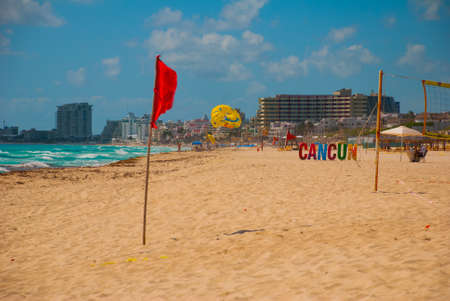 Cancun, Mexico, inscription in front of the Playa Delfines beach. Huge letters of the city name.の写真素材