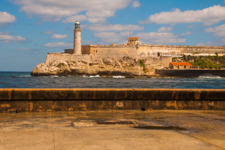 The Castillo Del Morro lighthouse in Havana. View from the Malecon promenade. The old fortress Cuba.の写真素材