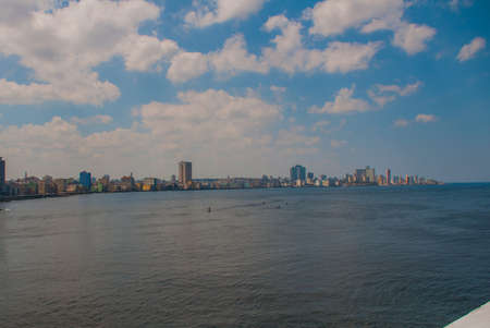 Landscape with city and Bay views. Huge houses skyscrapers in the distance. Havana capital of Cubaの写真素材