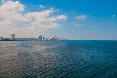 Landscape with city and Bay views. Huge houses skyscrapers in the distance. Havana capital of Cubaの写真素材