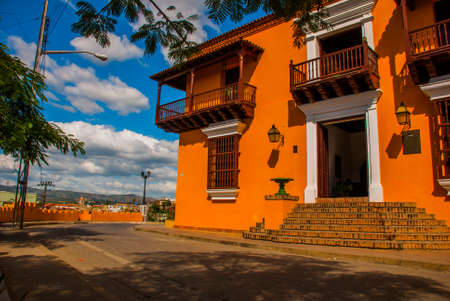 Old orange building, where now the school in the city center. Santiago de Cuba, Cubaの写真素材