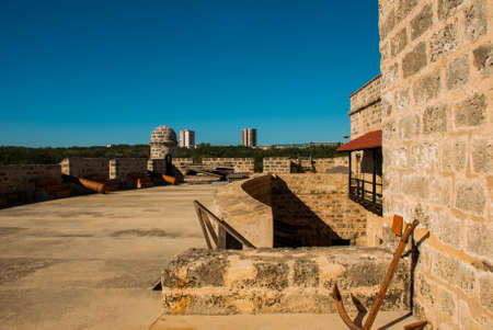 Cienfuegos, Cuba: Old weathered cannons and shots exposition near the walls of Jagua fortress. Fortaleza de Jaguaの写真素材