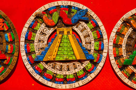 Mexico. Souvenirs for tourists in the market. Image of the Mayan pyramid.