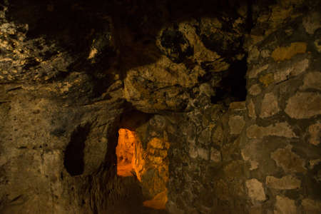 The Derinkuyu underground city is an ancient multi-level cave city in Cappadocia, Turkey. Stone used...