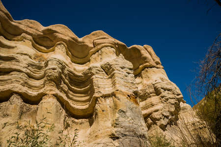 Zemi valley, Goreme region, Cappadocia, Anatolia, Turkey: Unique and incredible rock on the blue sky...