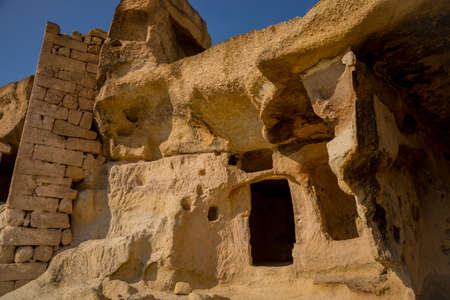 CAPPADOCIA, TURKEY. The old troglodyte settlement of Cavusin, where you can see the oldest rock cut church in the region Anatoliaの写真素材