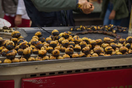 Roasted chestnuts in street vendors. Popular food among tourists and Turks. Istanbul, Turkey.の写真素材