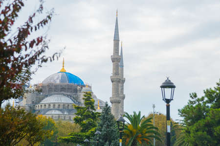Istanbul, Turkey: Minaret of the Blue mosque between the trees. The biggest mosque in Istanbul of...