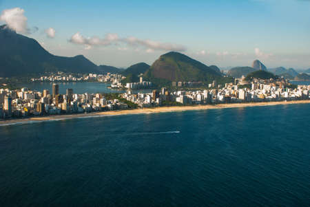 Aerial view of buildings on the beach front with a mountain range in the background, Ipanema Beach,...