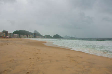 Rio de Janeiro, Brazil: The most famous beach, Copacabana beach in cloudy weather.