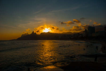 Rio de Janeiro, Brazil: Ipanema beach. Beautiful landscape with sea and beach at sunset. Beautiful and popular beach among Brazilians and tourists in Rio de Janeiro.の写真素材